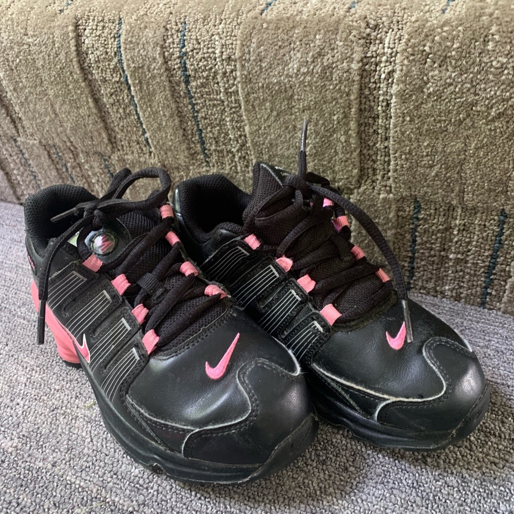 Nike Black and Pink Sneakers with Chunky Design and Robust Upper